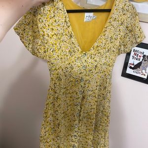 Princess Polly yellow floral mini short sleeve dress. Women’s Size 4.